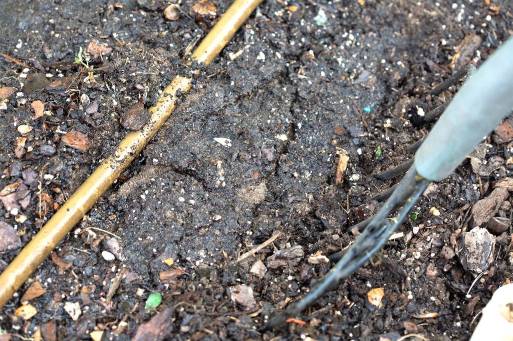 Pitchfork in soil